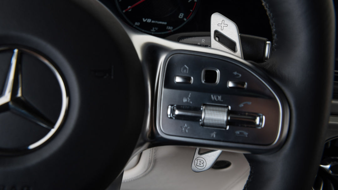 BRABUS Aluminum-Leather Paddle Shifters featuring matte aluminum construction and fine leather detailing for AMG models.