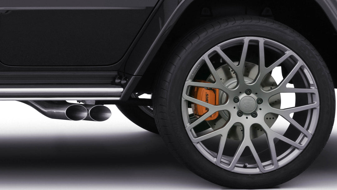 BRABUS Sport Exhaust System with two slanted 76 mm tailpipes in chrome or black chrome finish, designed for Mercedes-Benz G-Class W463A AMG G 63