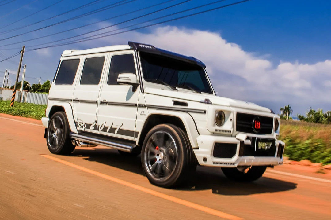 Full iPE catback exhaust system with T304 stainless steel piping for Mercedes W463 installed on a white G-Wagon 