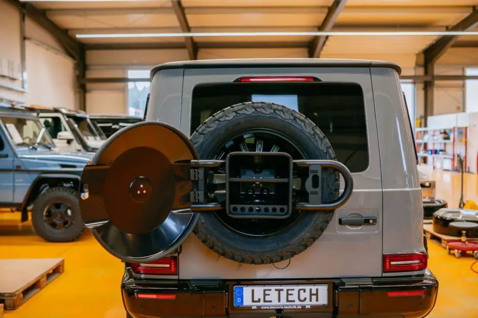 LETECH Spare Wheel Storage Compartment mounted on a G-Class 463A, showcasing its stainless steel shelf and organized storage