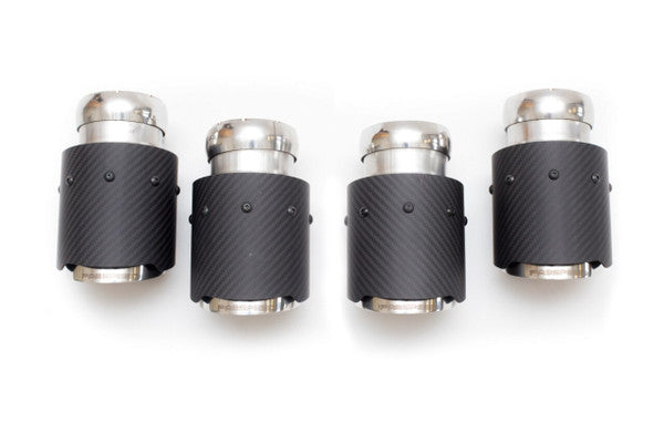 Close-up of Fabspeed's quad carbon fiber exhaust tips for Mercedes G-Wagen G63 AMG, featuring CNC mandrel-bent T304L stainless steel construction