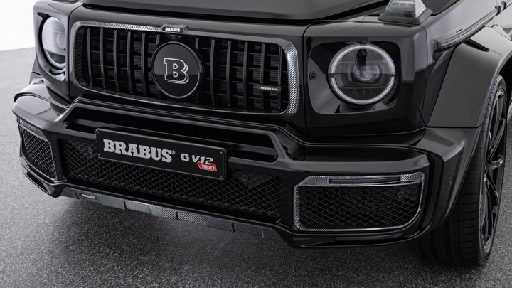 Luxury BRABUS Carbon Fiber Front Bumper Attachments for G-Class, featuring high-grade carbon fiber and integrated LED DRLs.