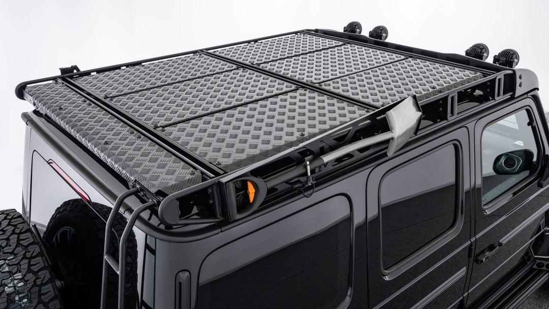 BRABUS Adventure Roof Rack installed on a Mercedes-Benz G-Class W463A, showcasing ample cargo space and rugged styling.