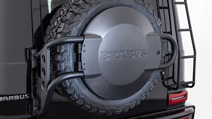 BRABUS Adventure Carbon Fiber Spare Wheel Holder for Mercedes G-Class W463A, featuring a swivel design for secure and easy spare wheel access.