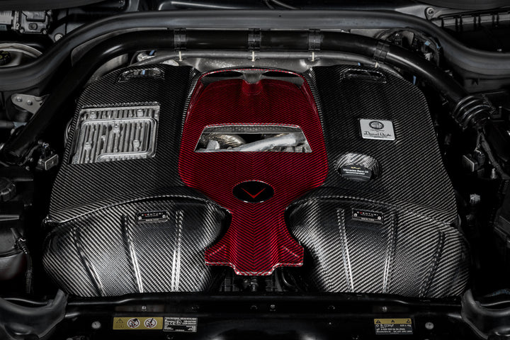 The Eventuri Carbon Fiber Intake System delivers dyno-proven performance gains and an exhilarating driving experience for your Mercedes-Benz G63 AMG installed close up shot from the front 