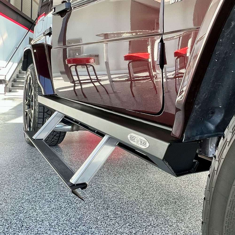 Rock Slide Engineering power step slider for Mercedes G-Class 4-door, shown fully deployed for easy access and luxury convenience.
