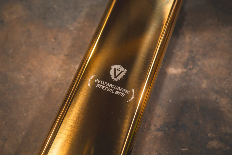 Valvetronic Valved Sport Exhaust system installed on Mercedes-AMG G63 with anodized gold slash-cut tips"