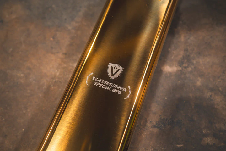 Valvetronic Valved Sport Exhaust system installed on Mercedes-AMG G63 with anodized gold slash-cut tips"