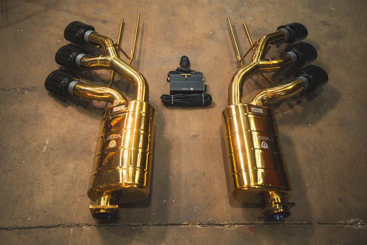 alvetronic Designs valved exhaust system for Mercedes-AMG G63 W463 with black ceramic tips, showing aggressive dual-pipe design