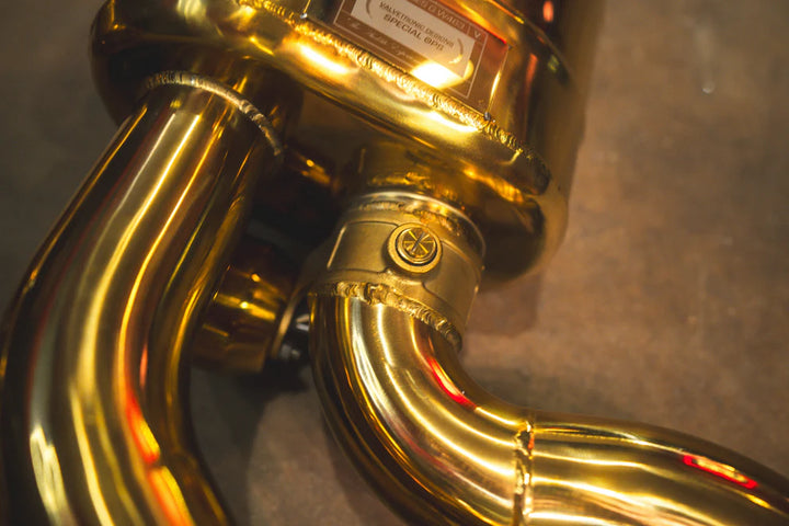 Side view of Valvetronic valved exhaust installed on Mercedes-AMG G63 W463, showcasing OEM-fit alignment
