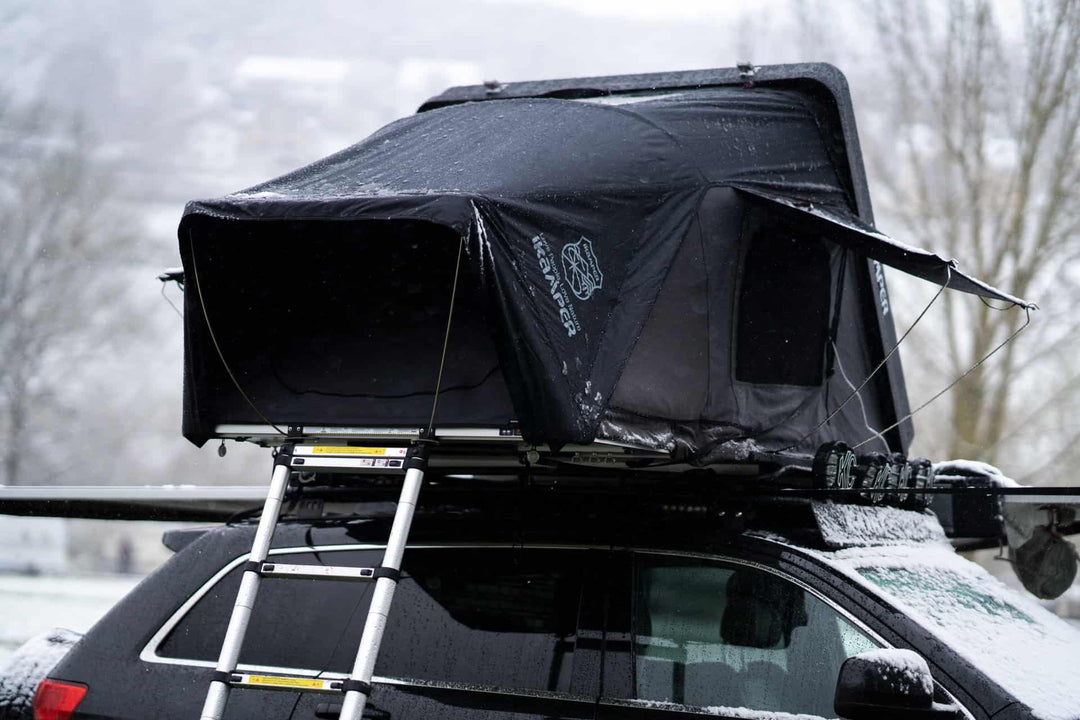 GOBI Racks iKamper Skycamp 3.0 Mini Roof Top Tent deployed on a vehicle with a GOBI Roof Rack, showcasing its compact footprint and versatile design.