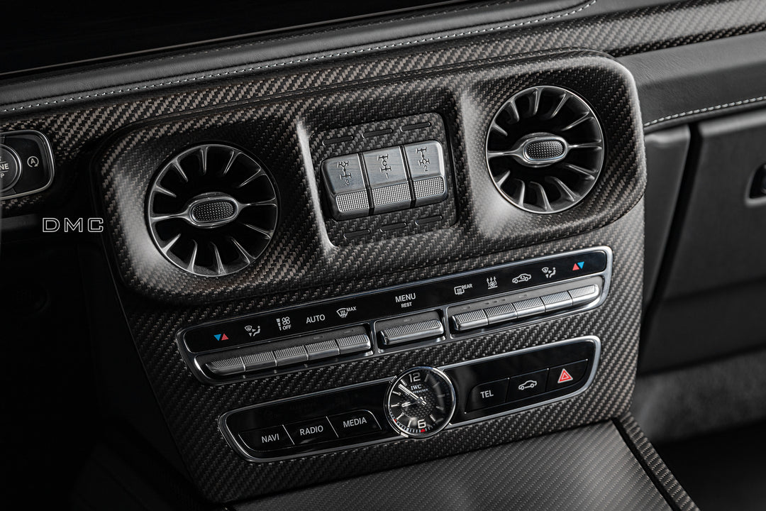 Mercedes-AMG G-Class dashboard with DMC carbon fiber AC vents - seamless OEM integration close up shot