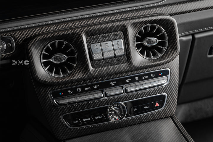 Mercedes-AMG G-Class dashboard with DMC carbon fiber AC vents - seamless OEM integration close up shot