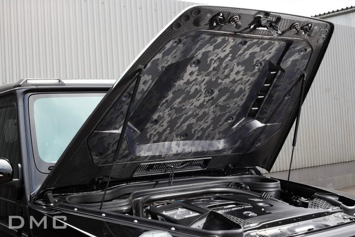 Underside view of DMC forged carbon hood for G-Class W464 – reinforced structure with OEM latch points