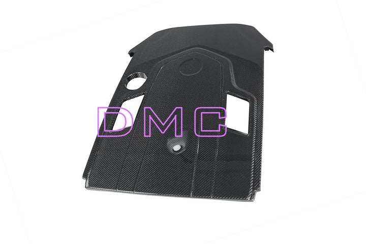 DMC carbon fiber engine cover for Mercedes-AMG G63 (2019-2025) - glossy finish with visible weave pattern fully assembled on a white background