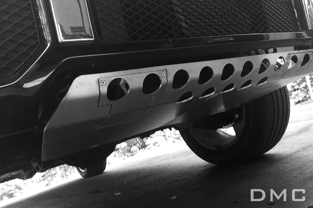 DMC aluminum skid plate installed on Mercedes-AMG G63 (W463A) - TUV-certified winch-ready underbody protection