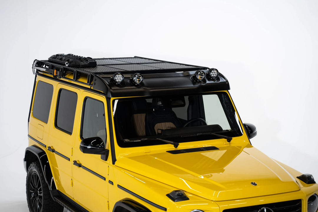 LETECH Wind Deflector installed on a G-Class roof rack, showcasing its seamless integration and aerodynamic design.