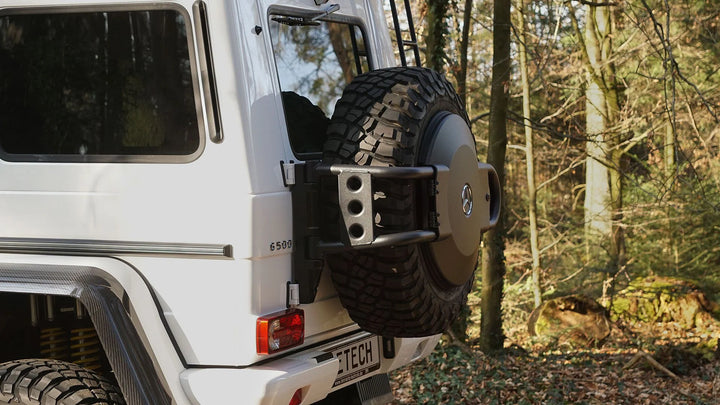 LETECH Spare Wheel Holder mounted on a Mercedes G 500 4×4², showcasing swivel action and rugged 8-hole rim compatibility