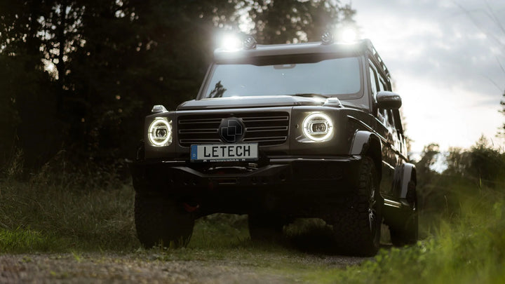 LETECH Wind Deflector installed on a G-Class roof rack, showcasing its seamless integration and aerodynamic design.