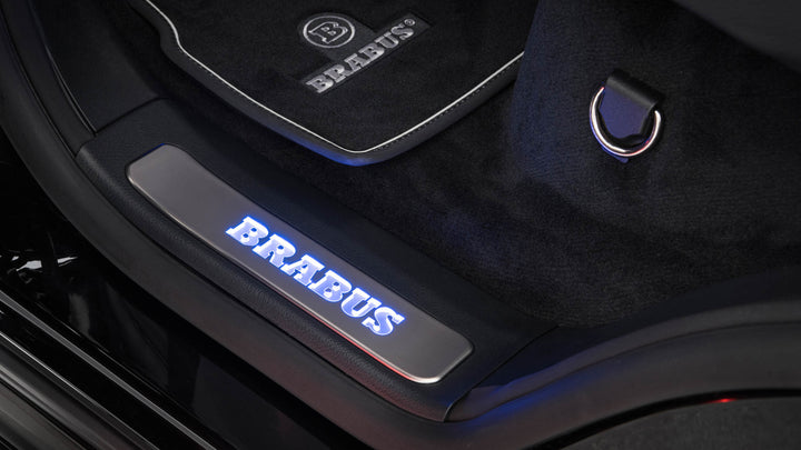 BRABUS Scuff Plates with RGB-LED illumination featuring 64 customizable colors and the iconic BRABUS logo for Mercedes G-Class W463A
