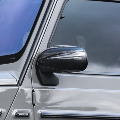 Textured carbon fiber surface of Urban Automotive mirror caps for G-Class (2019+ W463A).