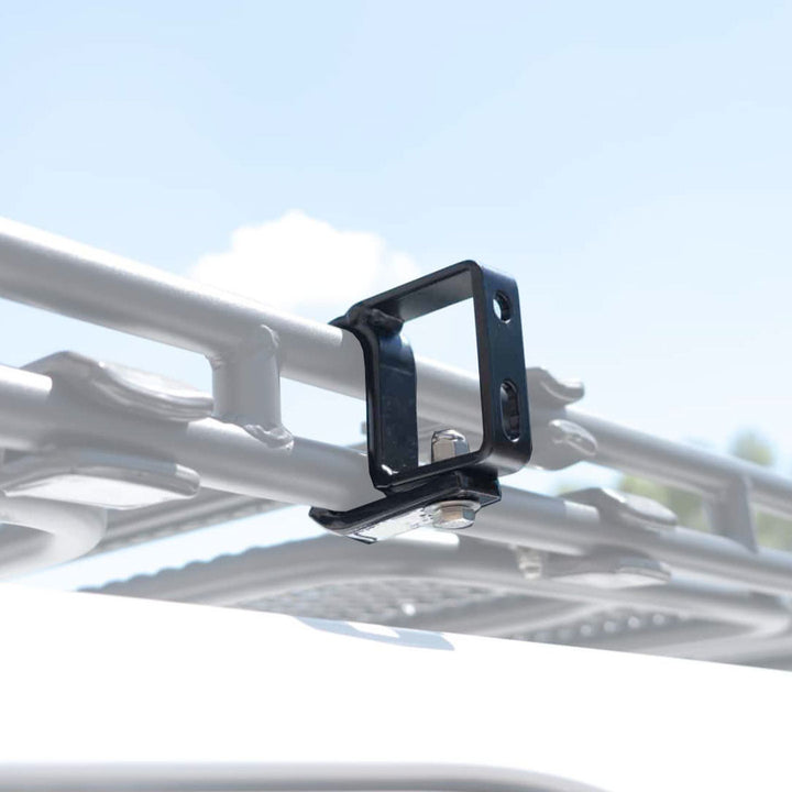 GOBI Triple Support Awning Brackets for G-Wagon Stealth Rack: 3-point stability, universal compatibility, powder-coated durability close up shot installed on white g wagon 
