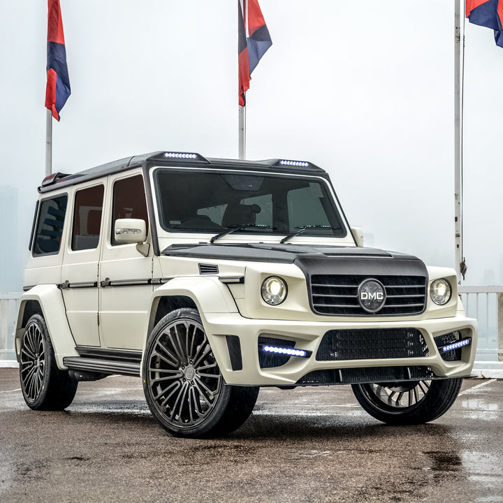 front view of DMC ZEUS Carbon Wide Body Fenders installed on black AMG G63 W463
