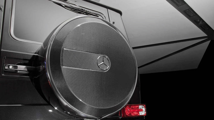 DMC carbon fiber spare wheel cover for Mercedes-Benz G-Class W463A/W464 (2015-2025) with high-gloss 3K weave finish