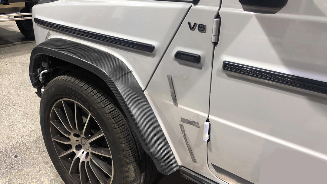 Close-up of pre-preg carbon weave on DMC fender flare vent