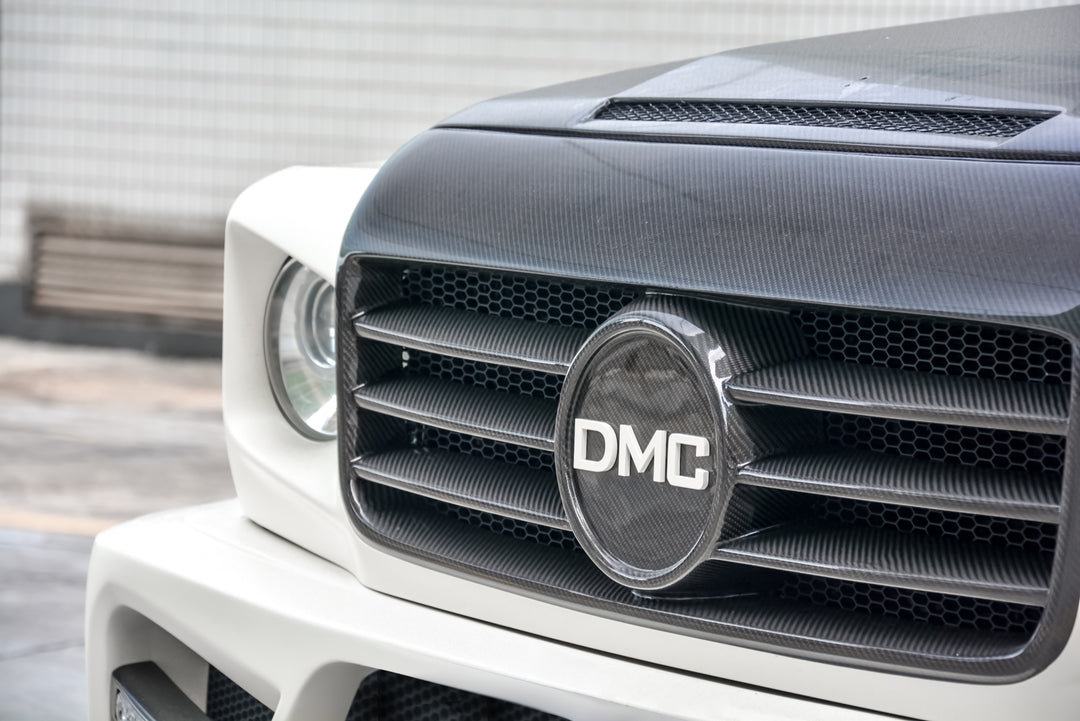 DMC Zeus grill & headlight frame installed on Mercedes-AMG G55 with ZEUS widebody kit