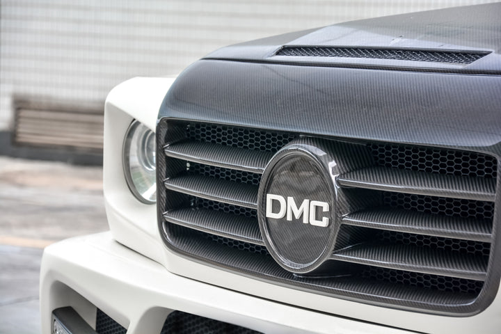 DMC Zeus grill & headlight frame installed on Mercedes-AMG G55 with ZEUS widebody kit