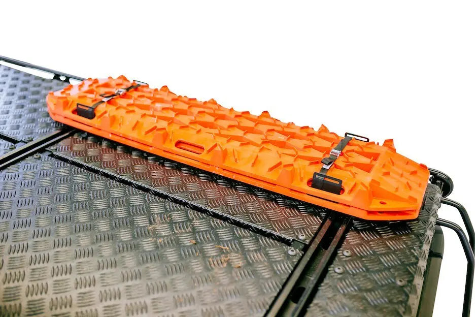 LETECH Sand Plate Holder installed on a G-Class roof rack, showcasing its secure and accessible design with MAXTRAX sand plates.