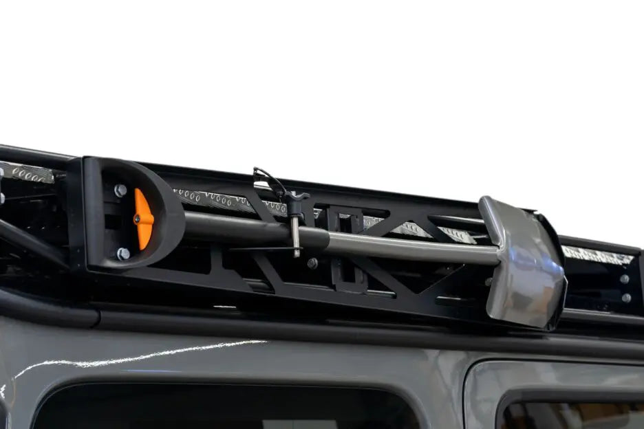 LETECH Shovel Holder installed on a G-Class roof rack, providing a secure and convenient solution for transporting your shovel.
