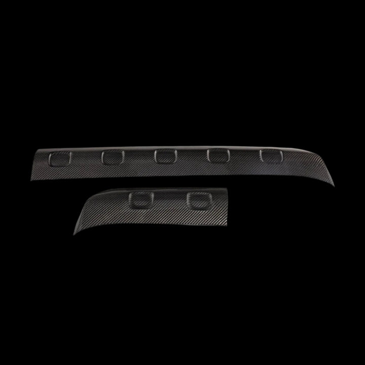 Urban Automotive OEM carbon fiber front skid plate for Mercedes-AMG G-Class (W463), featuring forged high-gloss weave and direct bolt-on fitment.