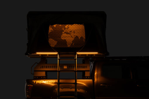 GOBI Skycamp DLX Roof-Top Tent deployed on a 4x4 with GOBI Rack, showcasing panoramic windows and stargaze panel under a mountain sunset.