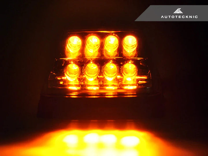 Amber LED illumination from smoked turn signals at night - enhanced 180° visibility with integrated reflectors"