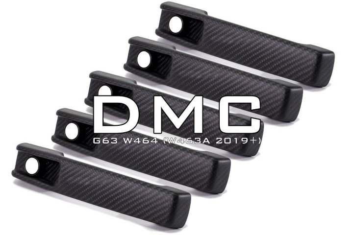close up showing carbon fiber weave on door handle trims for DMC exterior kit