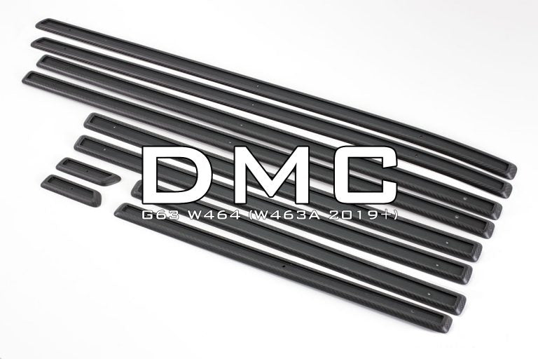 DMC Carbon fiber tirm kit for g-wagon laid out on a white background