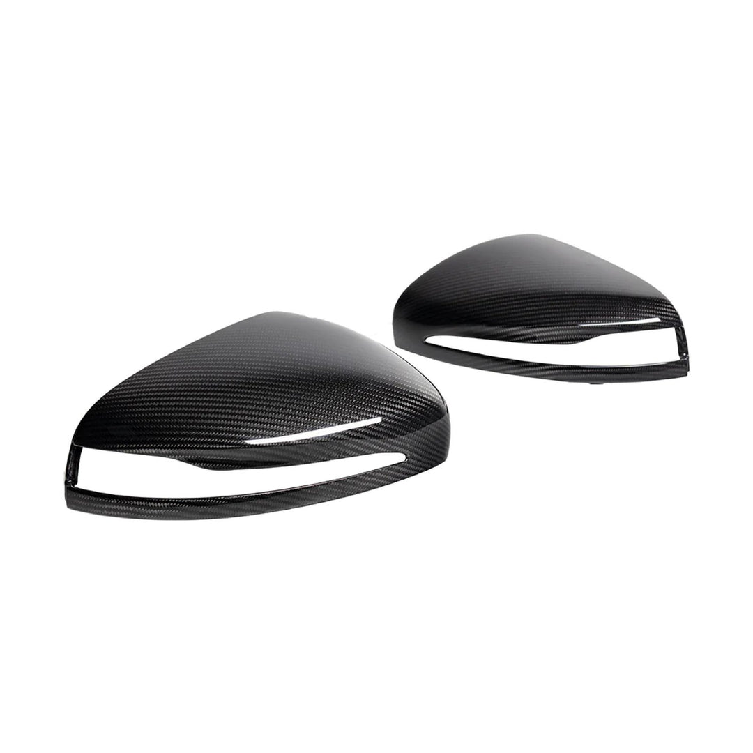 Urban Automotive carbon fiber wing mirror caps for Mercedes-AMG G-Class (W463), featuring high-gloss forged weave and direct OEM-fit installation.