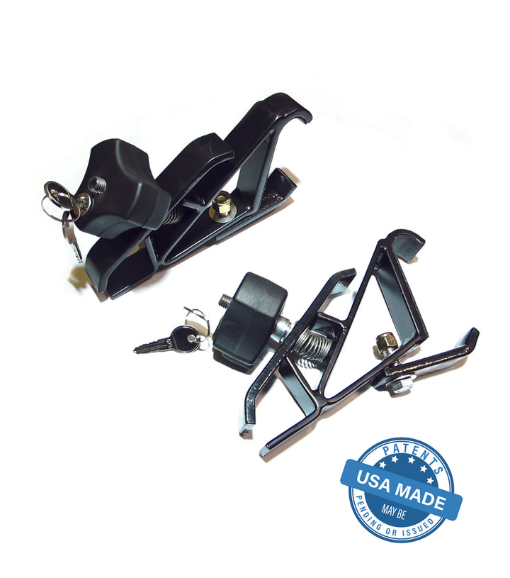 Close-up of black powder-coated GOBI Brackets gripping an axe, highlighting corrosion-resistant finish