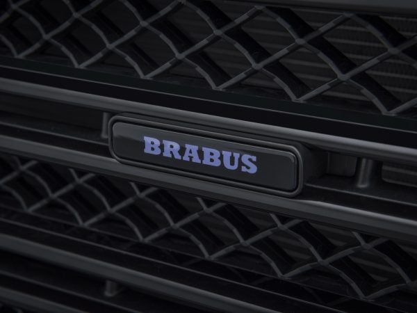 BRABUS Illuminated Grille Emblem for Mercedes G-Class W463A, featuring LED lighting and iconic BRABUS branding for a luxury upgrade.