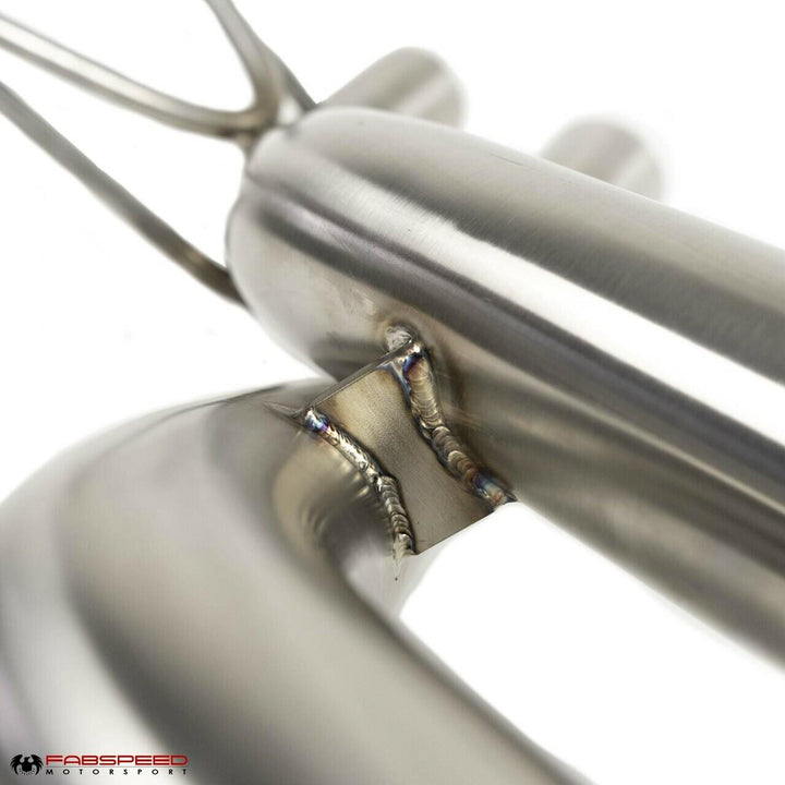 close up showing detailed welds on connecting pipes of fabspeed exhaust system 