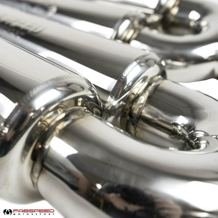 Investment cast stainless steel Y-pipe with dual resonators on Fabspeed G63 exhaust system, reducing weight by 19 lbs versus stock