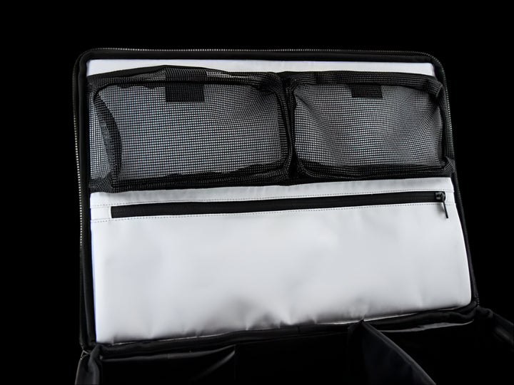 Side view of Front Runner Flat Pack displaying sturdy carrying handles and modular storage compatibility