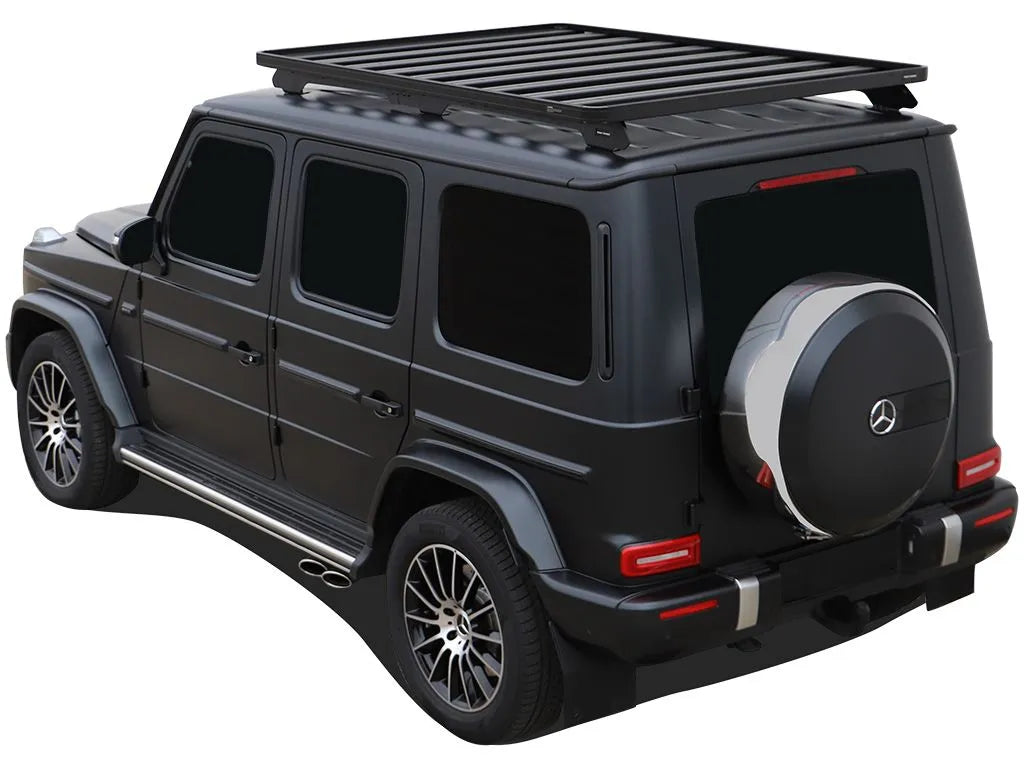 Overhead shot of the full-size Slimline II Roof Rack spanning the roof of a Mercedes G-Class, demonstrating ample cargo space and rugged durability.