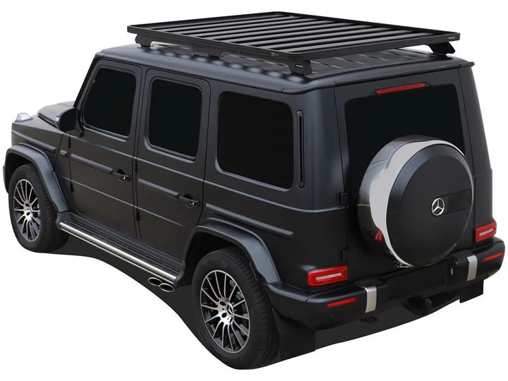 Overhead shot of the full-size Slimline II Roof Rack spanning the roof of a Mercedes G-Class, demonstrating ample cargo space and rugged durability.