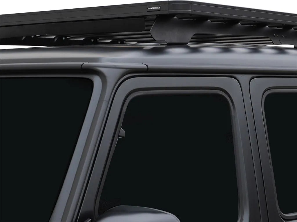 Front Runner Slimline II Roof Rack installed on a Mercedes G-Class 4-door, showcasing sleek black powder-coated aluminum construction and modular design.