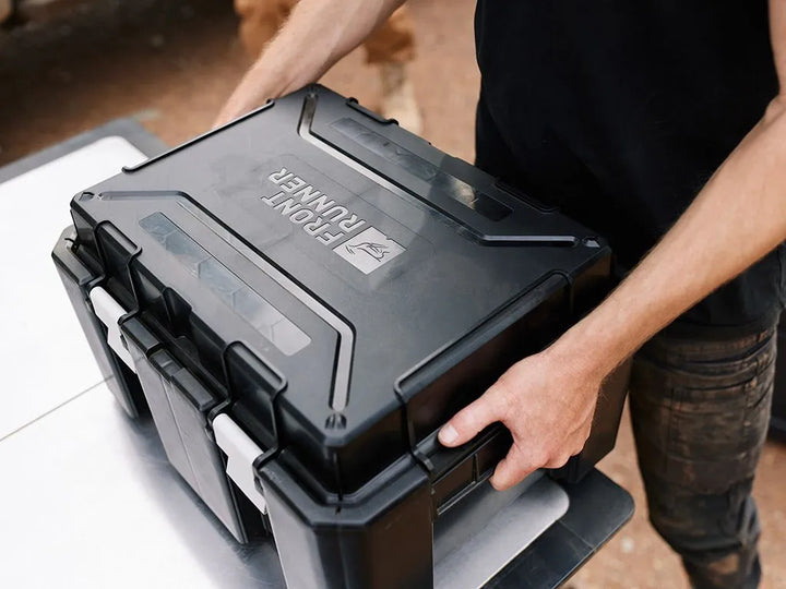 Durable Wolf Pack Pro box with Hi-Lid protecting outdoor equipment from dust and moisture during rugged overlanding trips.