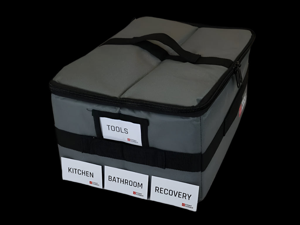 Front Runner Flat Pack storage box unfolded, showing adjustable vinyl-lined compartments for camping and overlanding gear