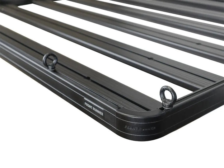 Set of Black Tie Down Rings with M8 hex bolts and nylon washers, ready for tool-free installation on a roof rack